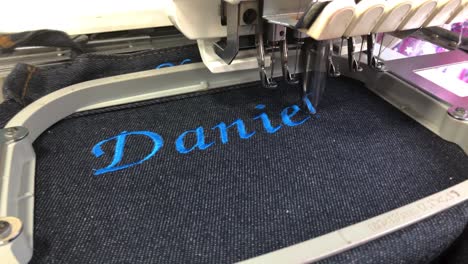 Embroidery-name-Daniel-on-fabric-using-an-embroidery-machine