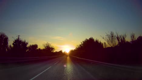 Car-moves-along-an-asphalt-road