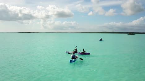 Group-of-kayakers-paddling-on-the-ocean-off-the-coast-of-Providenciales-in-the-Turks-and-Caicos-archipelago