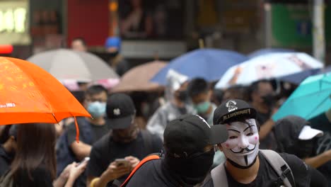 Demonstranten-In-Hongkong-Tragen-Guy-Fawkes-Masken-In-Einer-Menschenmenge