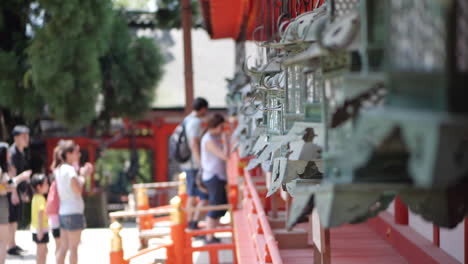 Shrine-wall-Hanging-With-Many-Metal-Lanterns