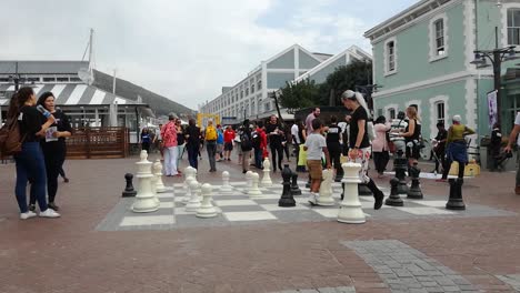 Passers-by-at-the-popular-Cape-Town-tourist-destination-V-A-Waterfront-in-the-holiday-season
