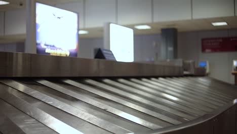 Conveyor-belt-starting-up-at-the-Baggage-Claim-at-the-Salt-Lake-Airport