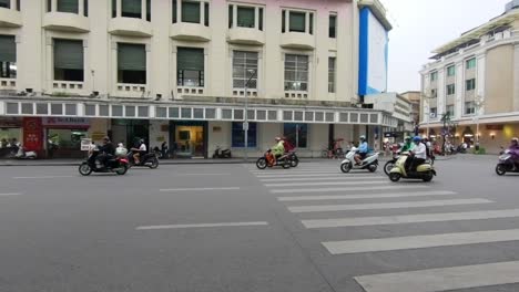 Motorcycles-riding-along-the-streets-of-Hanoi