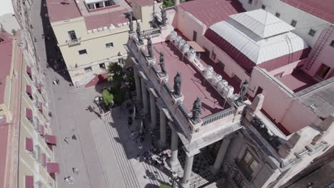 Aerial-shot-of-people-walking-in-the-historic-center