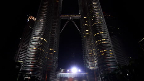 Illuminated-Malaysian-landmark-Petronas-Twin-Towers-at-night,-Kuala-Lumpur