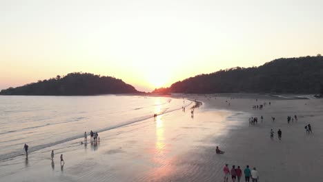 People-enjoy-sunset-at-Palolem-beach