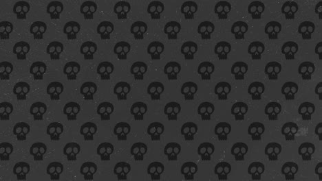 Animación-De-Fondo-De-Halloween-Pequeñas-Calaveras-Negras-Moviéndose-Hacia-La-Izquierda-Sobre-Fondo-Gris