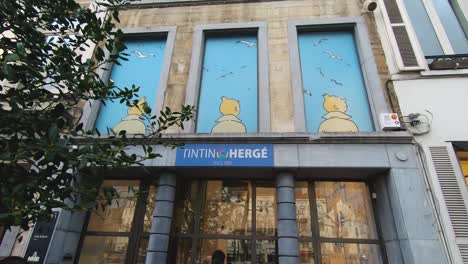 Tintin-at-Brussels,-Belgium,-Graffiti,-Mural,-Metro,-Atomium,-Bus,-Statues,-and-Squares-in-slow-motion