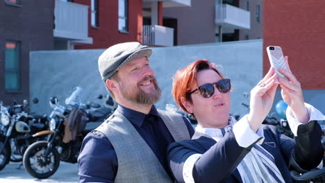 Cute-couple-taking-a-selfie-after-the-Distinguished-Gentlemans-Ride-in-Ghent-Belgium