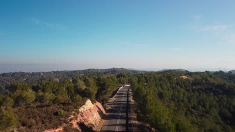Scenic-road-through-the-Marganell-region-of-Barcelona,-Spain-on-a-sunny-day