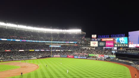 Singing-"Take-me-out-to-the-ball-game"-during-the-seventh-inning-at-a-New-York-Yankees-baseball-game-at-Yankee-Stadium