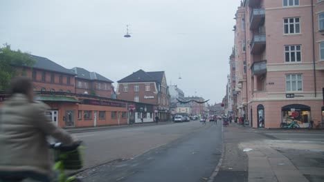 Amagerbrogade-in-Copenhagen-Denmark-on-a-cold,-wet-and-overcast-day