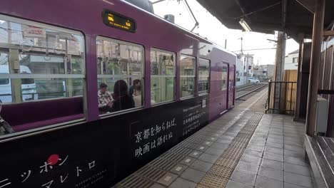 A-Smal-Train-Stop-On-The-Station-In-Kyoto-Town,-Japan