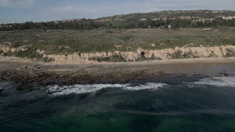 Drone-Flying-Away-From-Beach-Coastline-Crystal-Cove-State-Park