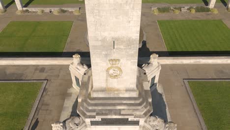 Rising-drone-footage-of-Navy-War-Memorial-Southsea-with-Southsea-Common-behind-on-bright-sunny-day