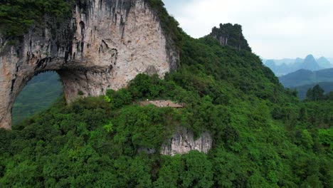 Yangshuo-Yueliang-Shan-stone-arch-in-Guilin-also-known-as-Moon-Hill,-China