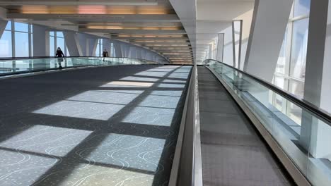 Denver,-Colorado---USA---April-9,-2020:-Empty-Terminal-Causeway-at-Denver-International-Airport-During-COVID19-Pandemic