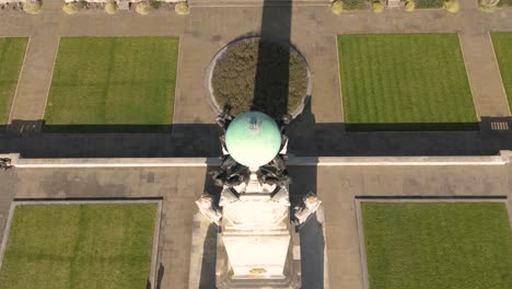 Navy-War-Memorial-Southsea-directly-overhead-low-flight-showing-perfect-symmetry-on-bright-sunny-day