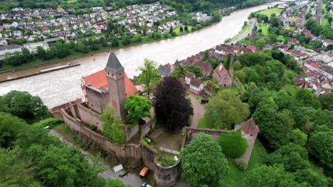Hirschhorn-castle-at-river-Neckar,-Germany.-Aerial-video