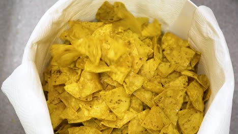 tortilla-chips-falling-in-slow-motion,-food-video,-great-quality-nacho-crisps