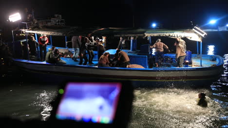 Shooting-a-video-on-a-boat-in-the-sea