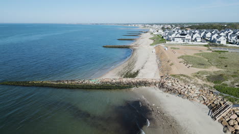 Drone-aerial-footage-of-Dennis-Port,-Nantucket-Sound,-MA,-showing-the-beach-in-morning