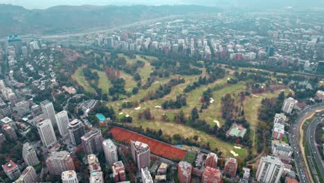 Aerial-overview-of-the-Club-de-Golf-Sport-Francais,-misty-day-in-Vitacura,-Chile