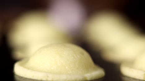 Close-up-of-freshly-baked-muffins-in-tray