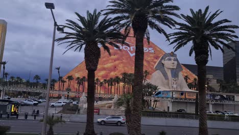 Las-Vegas-USA,-Luxor-Casino-Hotel-With-Doritos-Advert-and-Sphinx,-View-From-Strip-and-Moving-Vehicle