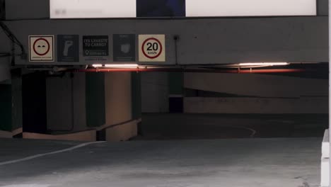 4K-video-of-underground-garage-exit-ramp-with-various-speed-signs-in-Panama-City