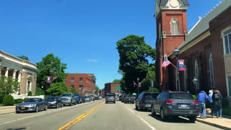 Footage-of-beautiful-Westfield,-New-York,-during-summer-with-old-brick-buildings-and-blue-skies