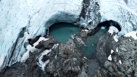 Drone-view-of-Brewster-Glacier-and-lakes-at-Brewster-Track-in-Mount-Aspiring-National-Park,-New-Zealand