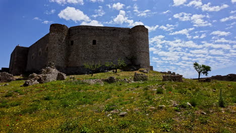 Frankish-Castle-of-Chlemoutsi-emerges-majestically-against-backdrop-of-azure-sky