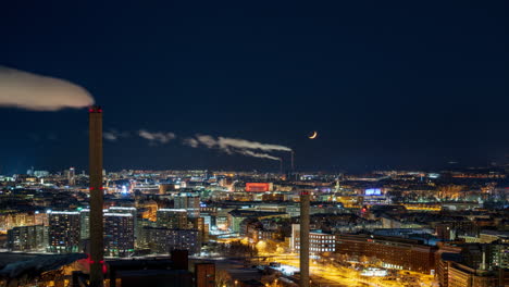 Time-lapse-of-the-Moon-crescent-moving-over-the-skyline-of-Helsinki,-during-LUX