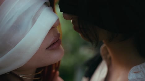 Cinematic-close-up-video-of-blindfolded-man-and-woman-softly-touching-while-kissing-capturing-intense-emotional-connection