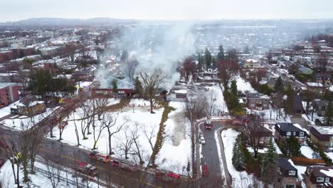 Fire-at-local-school-in-Montreal-Canada,-fire-brigade-station-extinguishing