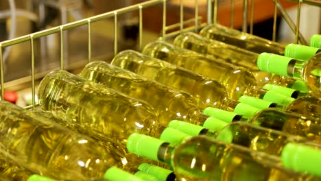 White-Wine-Bottles-Stacked-in-racks-in-Winery-Storage-Facility