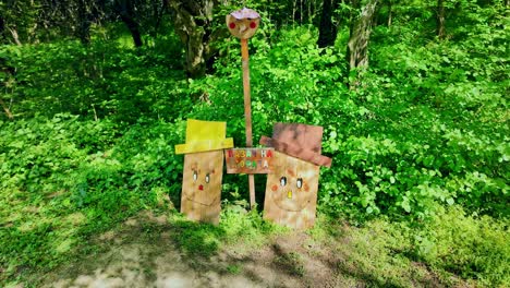 Colourful-smiley-creative-sign-reads-Keep-the-Forest-with-fire-beater