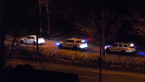 Motion-of-man-driving-car-arrested-by-police-at-night-in-Coquitlam-BC-Canada-with-4k-resolution