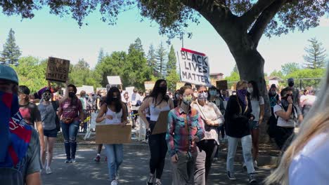 Peaceful-protest-with-hundreds-carrying-signs-originating-at-Burgess-Park,-Menlo-Park,-CA-on-June-1,-2020