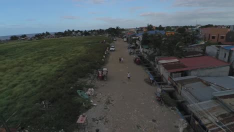 Aerial-Drone-Shot-of-Poverty-Stricken-Dirt-Road-in-Barangay-Neighborhood-near-Rosario-Cavite-Philippines-near-Manila-Bay