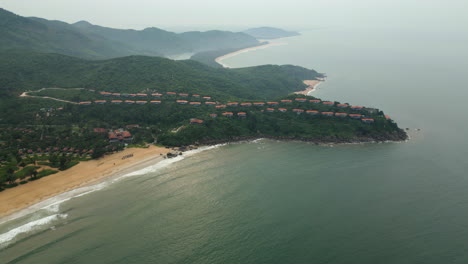 Lush-Jungle-Covered-Peninsula-In-Chan-May-Bay-Vietnam-With-Luxurious-Holiday-Villas