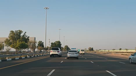 Traffic-navigates-through-Abu-Dhabi-E11-Sheikh-Maktoum-Bin-Rashid-road-towards-Dubai-on-the-second-lane,-which-is-limited-to-drivers-with-a-speed-limit-of-140-km-and-below