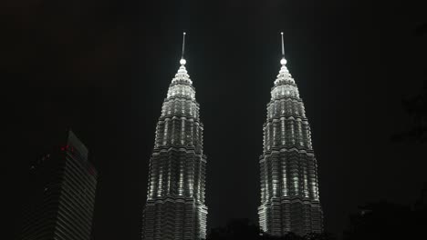Stunning-night-view-of-the-illuminated-Petronas-Twin-Towers-in-Kuala-Lumpur,-Malaysia