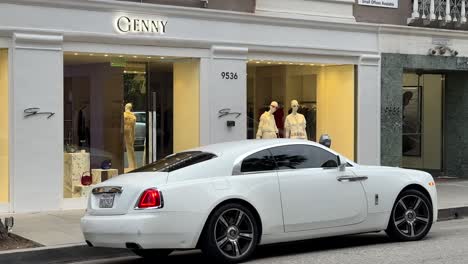 Rolls-Royce-parked-in-Beverly-Hill-off-of-Rodeo-Drive-in-front-of-Genny-high-end-store