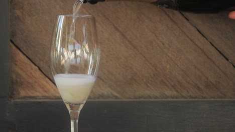 champagne-pouring-into-wine-glass