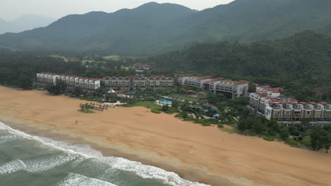 Drone-Sweeps-Over-Chan-May-Bay-Towards-Hidden-Holiday-Resort-In-Laguna-Lang-Co-Vietnam-60FPS