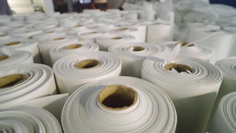 collection-of-Bolts-of-paper-and-cloth-after-being-manufactured-in-the-textile-industry-in-Pakistan