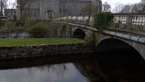 Galway-Cathedral-over-Bridge-Pan-Up-Slow-Mo